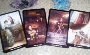 Riding the bus! With the Nine of Pentacles, Four of Cups, Two of Pentacles, and the Six of Swords, from the Steampunk Tarot. 